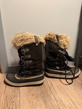 Sorel tall winter boots.